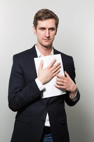 Studio shot of thoughtful businessman — Stock Photo, Image