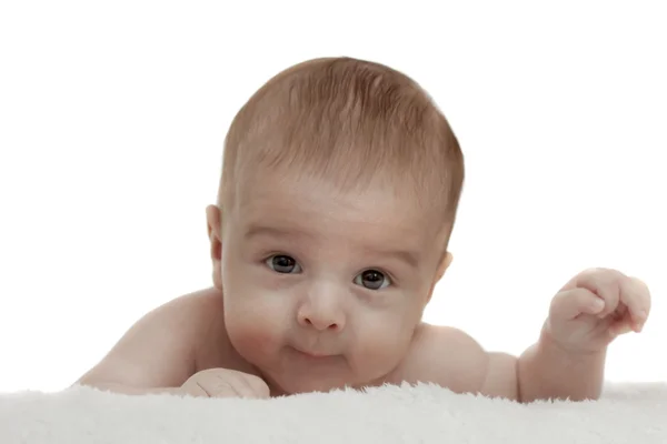 Bebé sobre un fondo blanco — Foto de Stock
