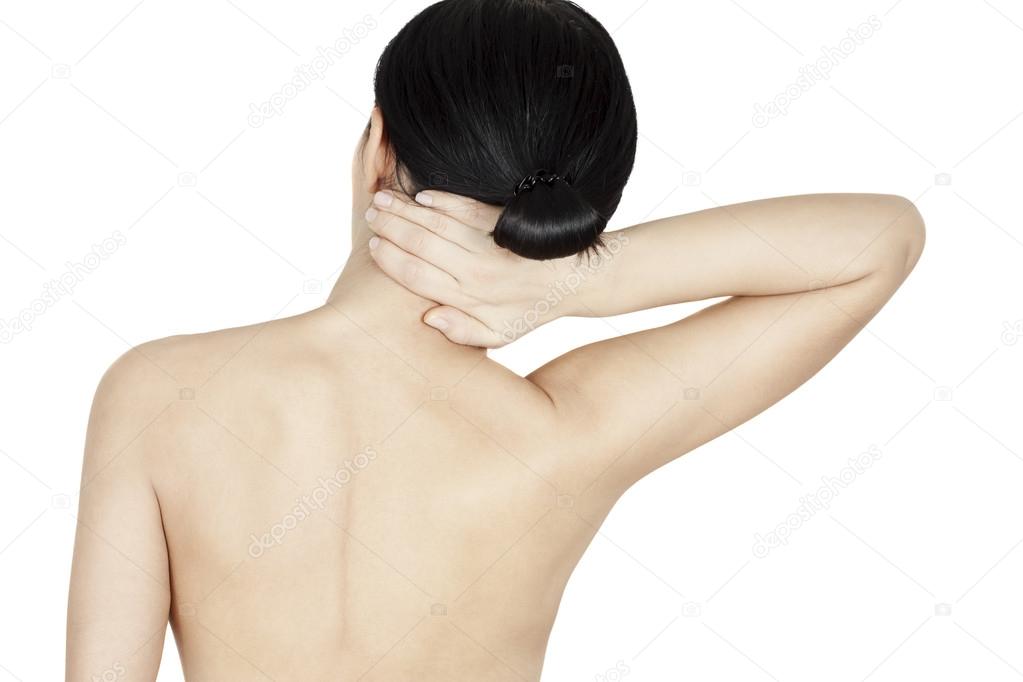 woman massaging her neck