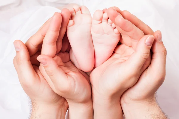 Hands of parents — Stock Photo, Image