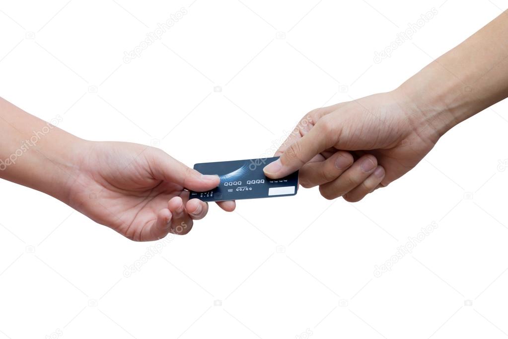 Holding and giving credit card over white background
