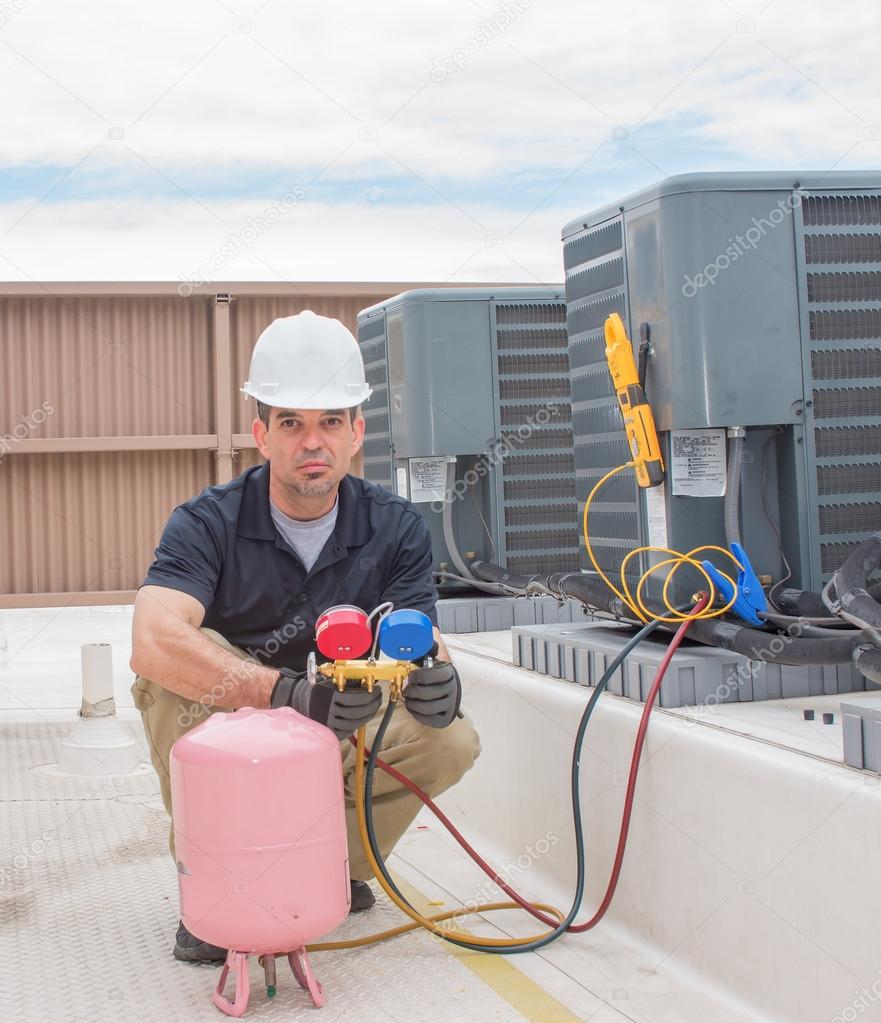 Hvac Technician Working — Stock Photo © spatesphoto 109882106