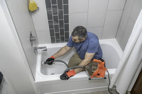 Plumber Drain Cleaning Bathtub Plumbers Snake — Stock Photo, Image