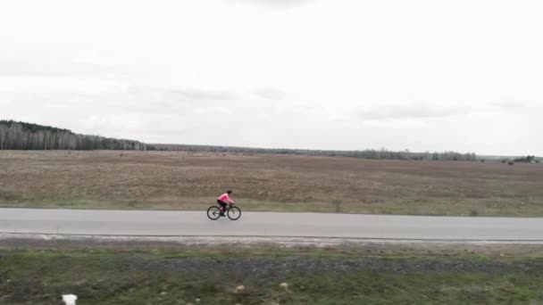 Cycling. Triathlon. Riding bike. Cyclist training on road bicycle. Fitness activity — Stockvideo