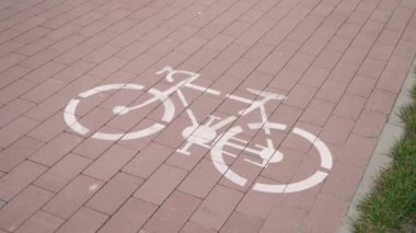 Bicycle sign on cycle path. Bike sign on street. Cycle lane with cycling sign