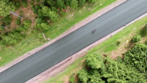 Cyclist cycling on bicycle. Cycling in forest. Triathlete training for bike race — Αρχείο Βίντεο