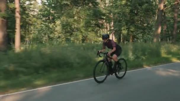 Intensive cycling training. Woman hard training on bike. Cyclist pushing pedals on bicycle — Stock Video