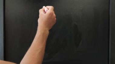 Hand drawing and writing word Play on chalkboard