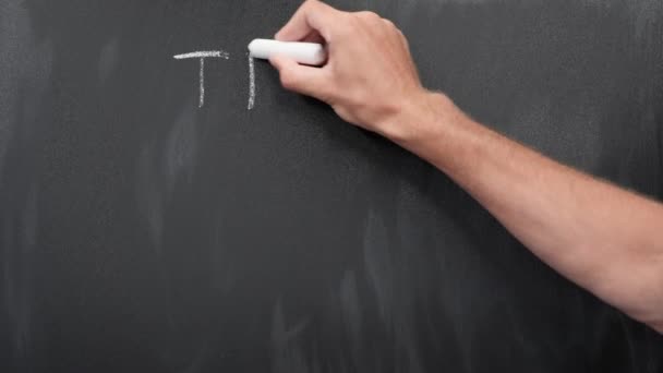 Trick ot treat written on blackboard with chalk. Happy halloween concept — Stock Video