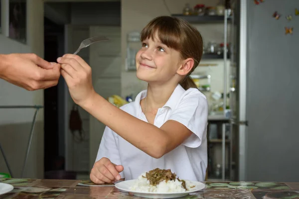 Girl Takes Fork Her Mother Hand While Preparing Dine Kitchen — Stock Photo, Image