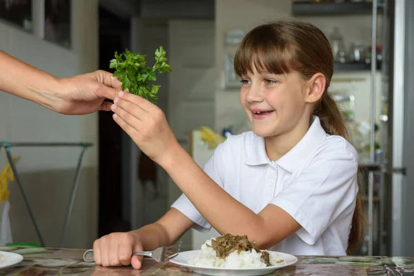 Girl Happily Takes Fresh Herbs Her Mother Hands Lunch — Stock Photo, Image