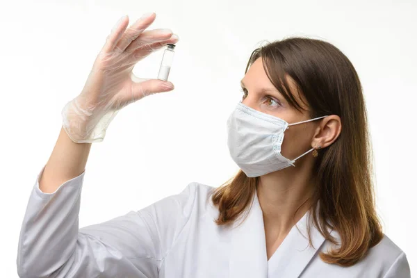 Doctor Looks Closely Drug Test Tube — Stock Photo, Image