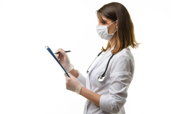 Girl Doctor Writes Pen Tablet Computer Sheet Paper — Stock Photo, Image