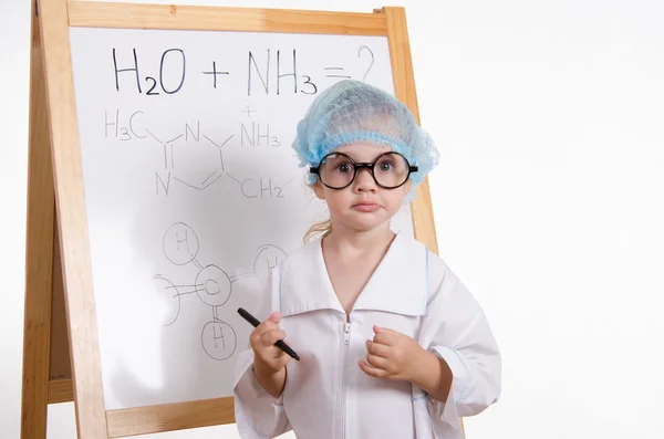 Chemist with a marker at the blackboard — Stock Photo, Image