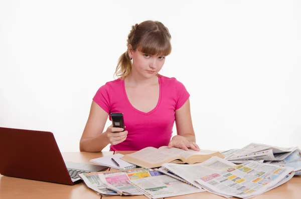 Athletic woman dials the phone book — Stock Photo, Image