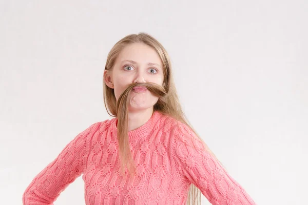 Cheerful girl mustache made a lock of hair — Stock Photo, Image