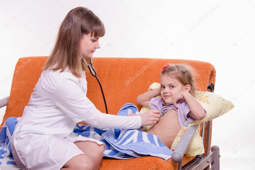 Pediatrician listening stethoscope baby breast