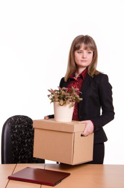 Dismissed girl in office with things hands of clipart