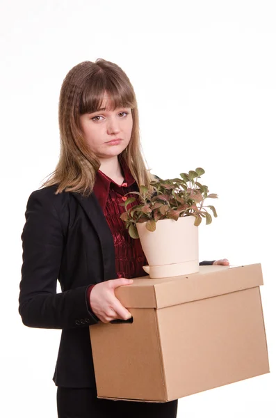 Portrait of a girl with box fired and flower in hands — Stock Photo, Image