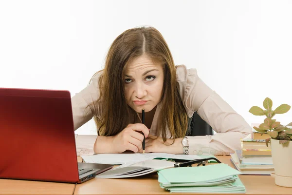 Very tired teacher checks homework — Stock Photo, Image