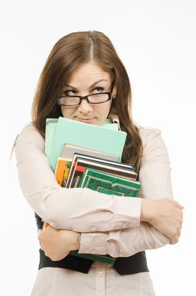 Zwielichtiger Lehrer mit Schulbüchern und Notizbüchern — Stockfoto