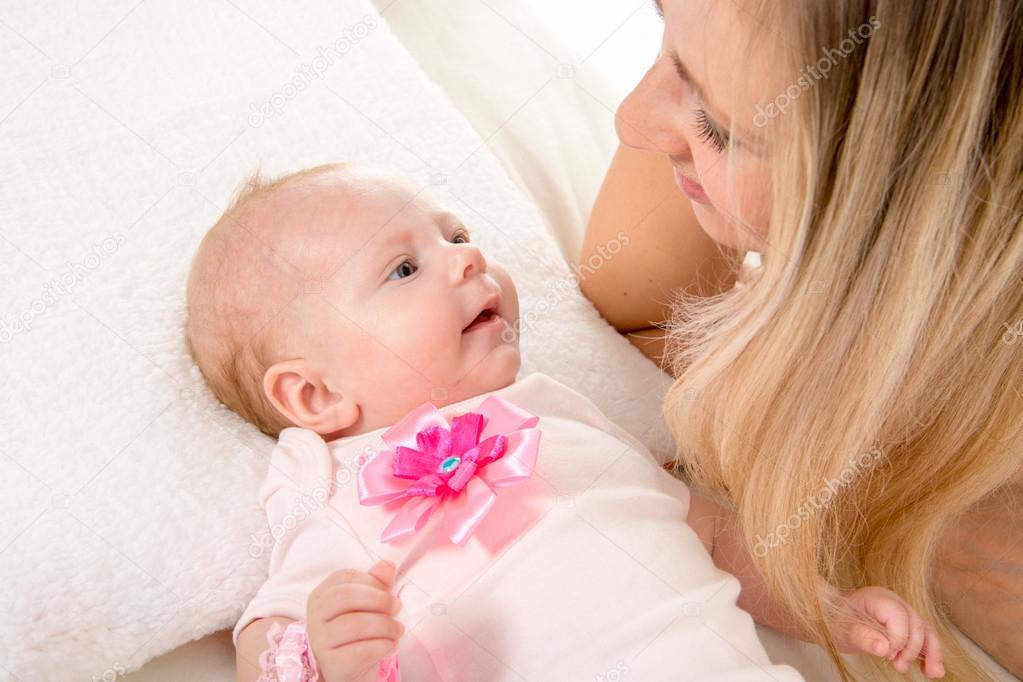 baby looking at mom