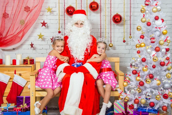 Children hugging awaited grandfather frost