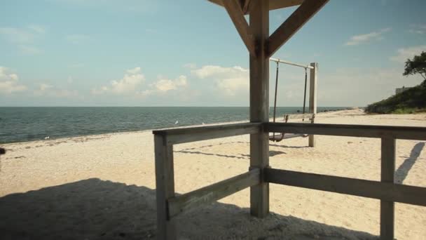 Beach from within gazebo — Stock Video