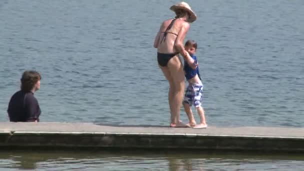 Relaxing on the beach boardwalk (6 of 9) — Stock Video