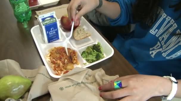 Students eating school bought lunch.  (1 of 2) — Stock Video