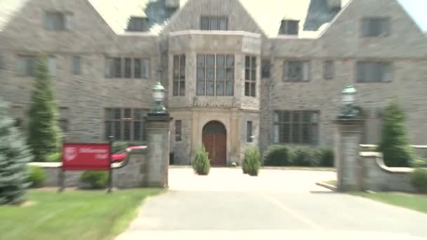 Stone building on college campus (1 of 2) — Stock Video