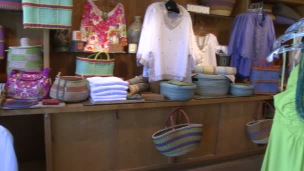 Displayed merchandise in a small clothing store (1 of 2) — Stock Video