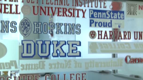 Glass window with names of potential colleges (1 de 3 ) — Video