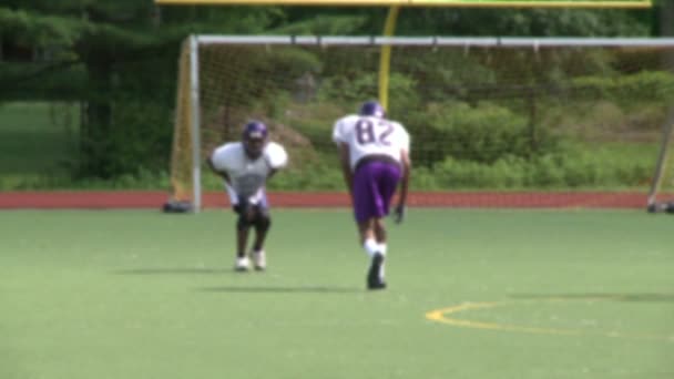 High school Football team practicing receiving (5 of 5) — Stock Video