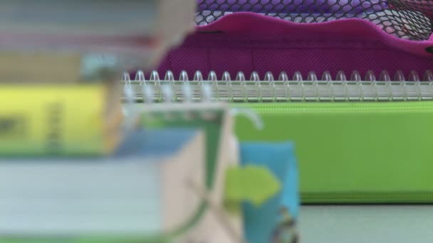 School books and notebooks on desk (2 of 5) — Stock Video