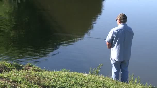 Man fishing on the river — Stock Video