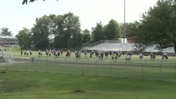 Connecticut high school football team warmup (2 av 3) — Stockvideo