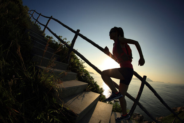 fitness woman on mountain stairs