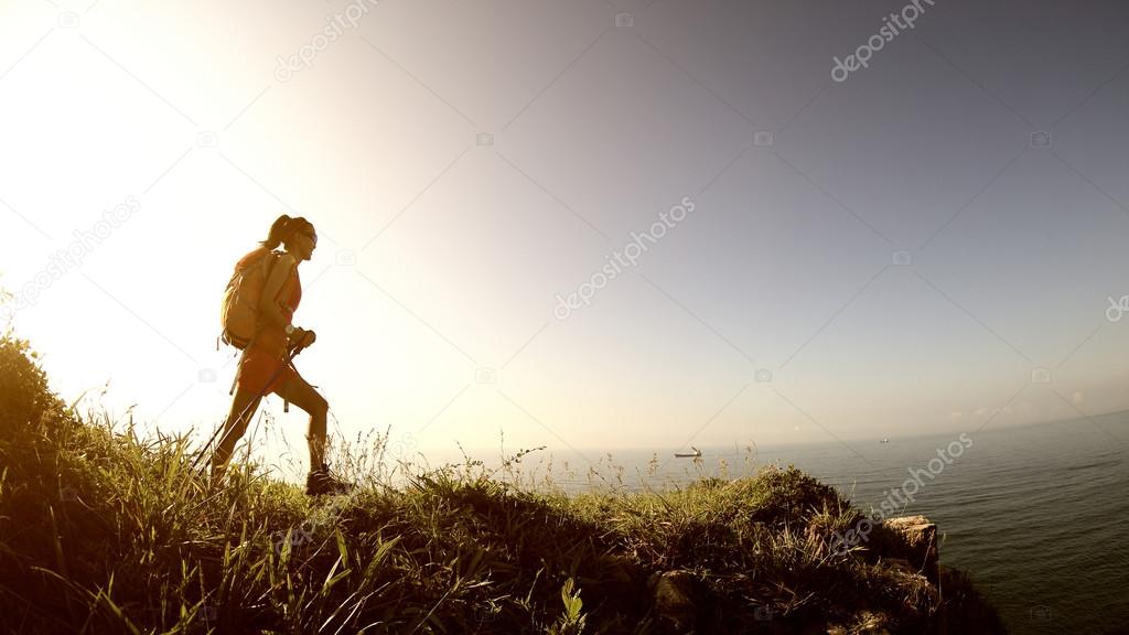 woman hiker on  mountain peak