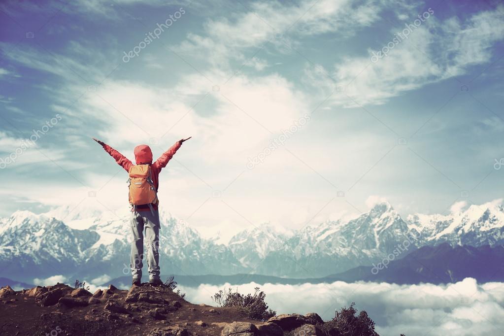 woman hiker with open arms