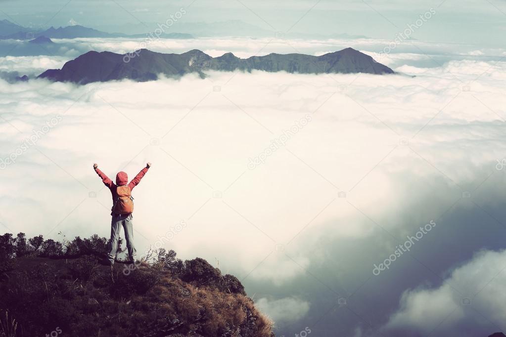 woman hiker with open arms