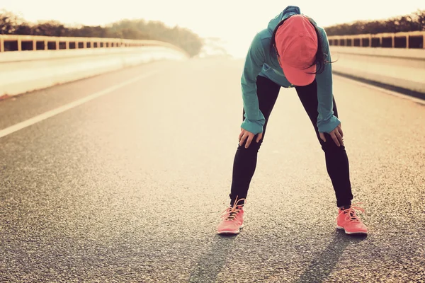 Tired woman runner — Stock Photo, Image