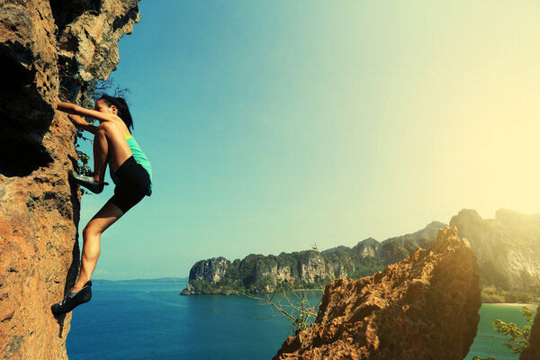 young woman rock climber 