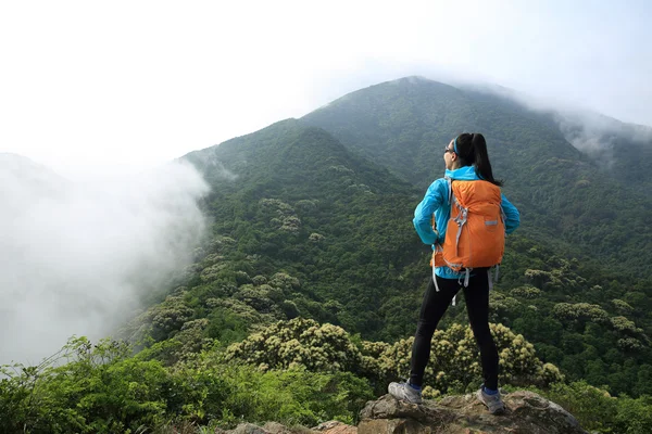 Young woman with backpacker — Stock Photo, Image