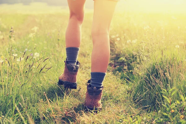 Young woman hiker legs walking — Stock Photo, Image