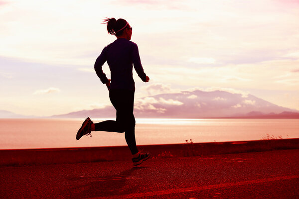 woman running on road