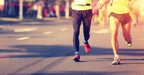 Neidentifikovaný maraton sportovce nohy — Stock fotografie