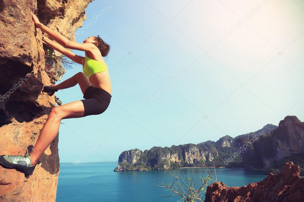 young woman rock climber 