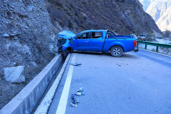 Accident pickup truck on mountain road in tibet,China