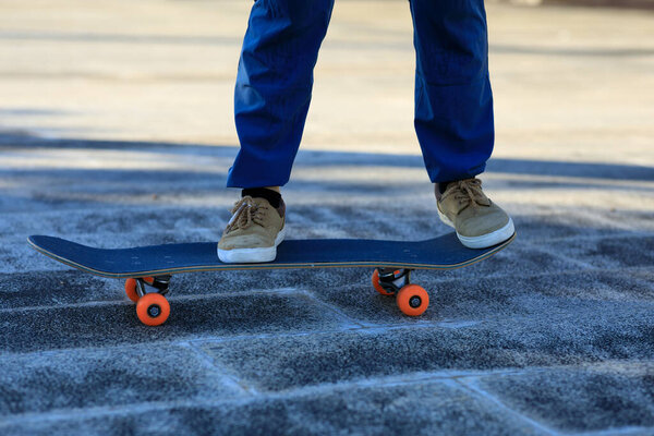 Skateboarder skateboarding outdoors in city